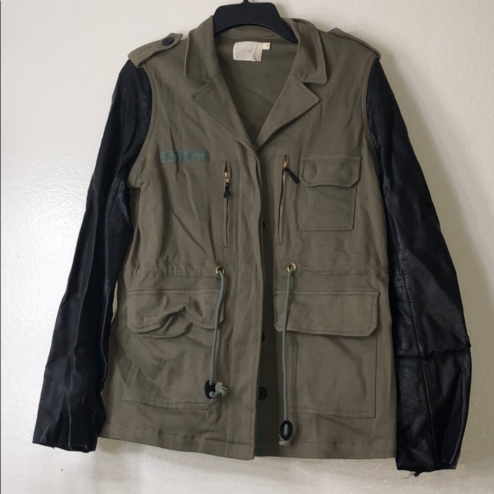Cargo jacket with leather sleeves. Size L